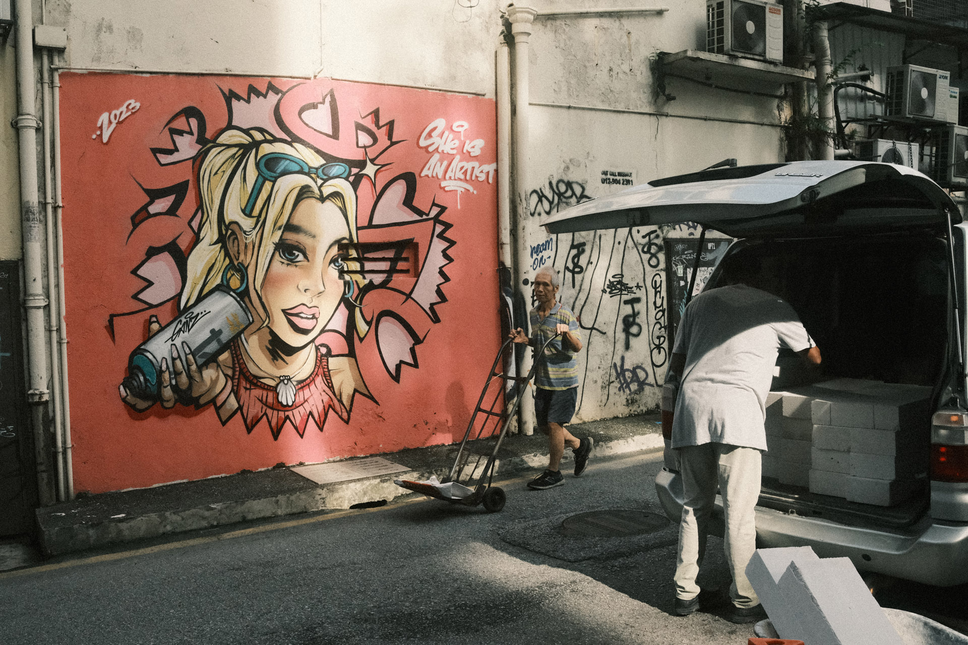 Wall art in Petaling Street back alley - Fujifilm Superia XTRA 400 Classic Negative film simulation recipe