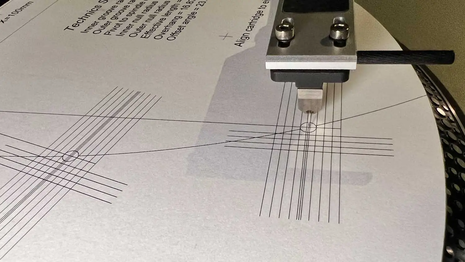 Align turntable cartridge for sound quality with protractor